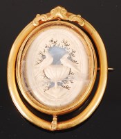 Lot 1235 - A 19th century carved ivory mourning brooch,...