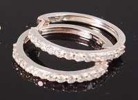 Lot 1240 - A pair of 18ct white gold hoop earrings, each...