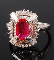 Lot 1243 - A contemporary 14ct white gold, ruby and...