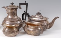 Lot 1095 - A circa 1900 silver harlequin four piece tea...