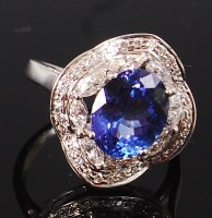 Lot 1247 - A contemporary 14ct white gold, tanzanite and...