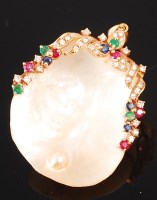 Lot 1248 - A mother of pearl, yellow metal, diamond, ruby,...