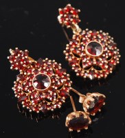 Lot 1251 - A pair of silver gilt and garnet set ear...