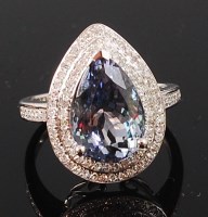 Lot 1274 - A contemporary 14ct white gold, tanzanite and...