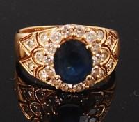 Lot 1276 - An 18ct gold, sapphire and diamond dress ring,...