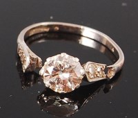 Lot 1285 - A platinum and diamond solitaire ring, the...