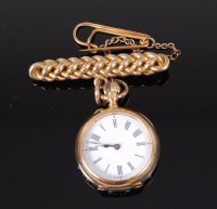 Lot 1229 - A ladies 18ct gold cased fob watch, having...