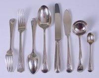 Lot 1101 - A George V silver part cutlery suite,...