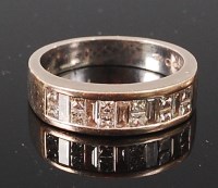 Lot 1259 - An 18ct white gold and diamond set half...