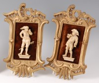 Lot 1377 - A pair of circa 1800 Continental carved ivory...