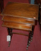 Lot 1255 - A mahogany nest of three occasional tables
