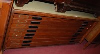 Lot 1257 - A 1950s teak and laminate inset low...