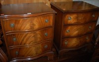 Lot 1273 - A pair of reproduction mahogany serpentine...