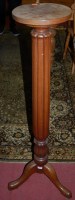 Lot 1274 - An Edwardian walnut plant stand, raised on...