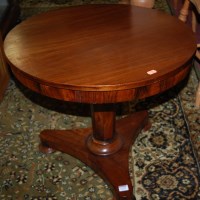 Lot 1278 - A 19th century rosewood circular pedestal low...