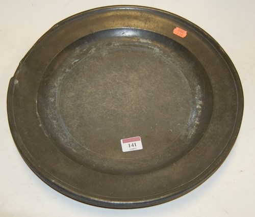 Lot 141 - A set of six early 19th century pewter plates,...