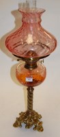 Lot 182 - A Victorian oil lamp having pink tinted glass...