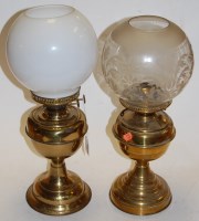 Lot 186 - An early 20th century brass oil lamp having an...