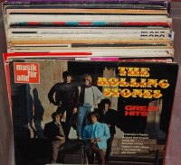 Lot 194 - A box of assorted LPs to include; Rolling...