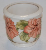 Lot 227 - A modern Moorcroft vase on a cream ground with...