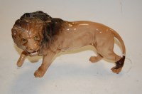 Lot 249 - A Beswick model of a lion, model No.2554B,...