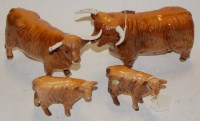 Lot 263 - A group of four Beswick cattle, to include;...