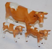 Lot 274 - A group of Beswick cattle to include; Guernsey...