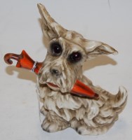 Lot 278 - A Goebel figure of a Scottie-dog with an...