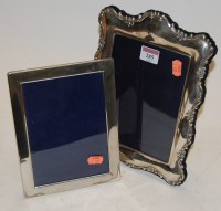 Lot 285 - A modern silver easel photo frame of shaped...