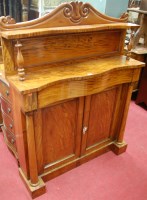 Lot 1216 - A Regency flame mahogany serpentine front...