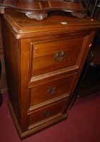Lot 1227 - A modern stained pine round cornered three...