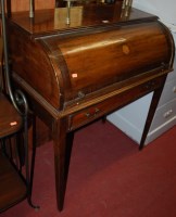Lot 1230 - A mahogany cylinder topped writing table,...