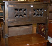 Lot 1236 - A moulded oak double door low side cupboard,...