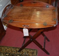Lot 1240 - A 19th century mahogany butlers tray, on...