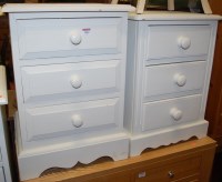 Lot 1244 - Two modern white painted pine three drawer...