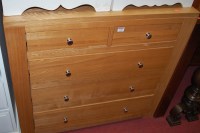 Lot 1245 - A contemporary light oak squarefront chest of...