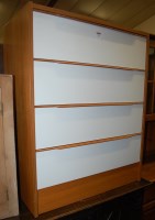 Lot 1251 - A 1970s teak laminate and white painted chest...