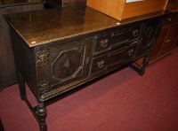 Lot 1252 - An early 20th century Jacobean moulded oak...