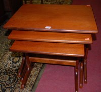 Lot 1289 - A 1960s G-Plan teak nest of three occasional...