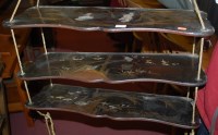 Lot 1293 - A Japanese black lacquered serpentine three...