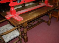 Lot 1294 - A 17th century style joined oak dining suite,...