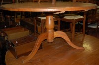 Lot 1296 - A modern pine circular breakfast table of good...