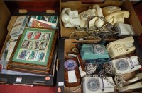 Lot 673 - Three boxes of vintage telephones; together...