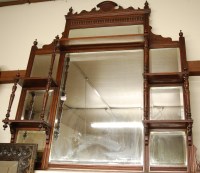 Lot 1028 - A circa 1900 walnut framed over mantel mirror,...