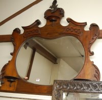 Lot 1029 - An Edwardian walnut framed over mantel mirror...