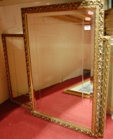 Lot 1084 - A modern gilt framed and bevelled wall mirror,...