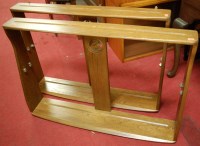 Lot 1105 - A pair of contemporary Ercol mid-elm wall...