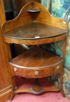 Lot 1111 - An early 19th century mahogany bowfront three...