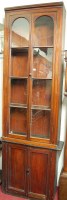 Lot 1114 - A 19th century mahogany bookcase cupboard, of...