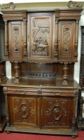 Lot 1116 - A late 19th century Flemish carved walnut...